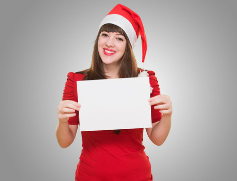 happy christmas woman holding a blank card