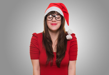 christmas woman wearing glasses and making a wish