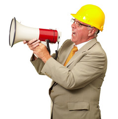 Senior Worker Shouting With Megaphone