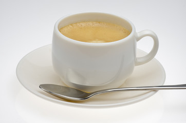 coffe with spoon on plate