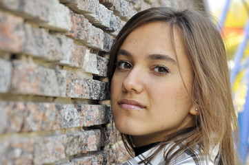 girl near a wall