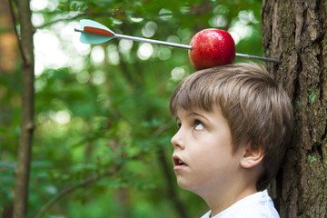 kid with apple on head