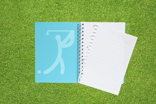 Book with Sport golf icon on grass background