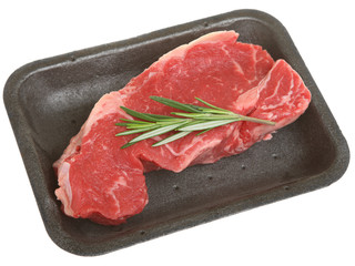 Raw Sirloin Steak in Plastic Packaging Tray
