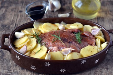 Meat with potatoes before cooking
