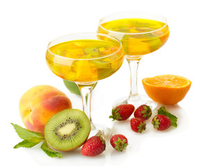 punch in glasses with fruits, isolated on white