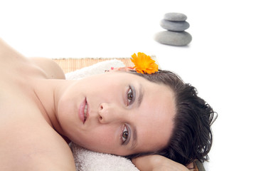Obraz na płótnie Canvas attractive woman with hot stones treatment at a spa