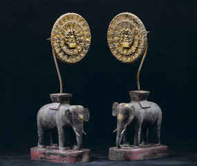 An antique wooden elephants