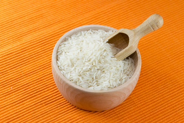 Basmati rice in wooden pot 
