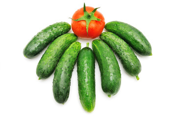 Cucumbers and tomatoes isolated on white background