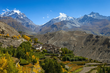 Snow peak mountains with village in front, Nepal