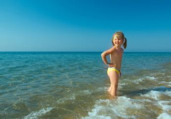 ittle girl on the beach