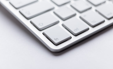 Part angle of light keyboard of the laptop, isolated
