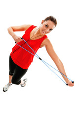 Girl exercising with elastic fitness band
