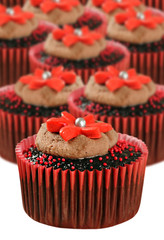 Chocolate cupcakes in red cups