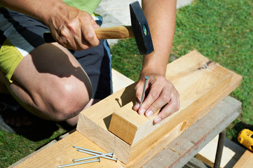 Man working with a hammer