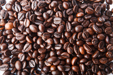 Heap of coffee beans. Isolated on white background