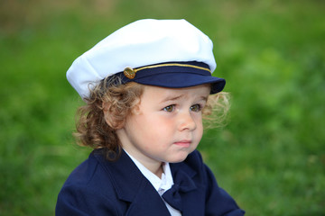 Young boy Wearing Navy Sailor Hat