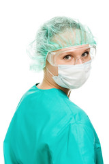 Surgeon woman in protective glasses and mask