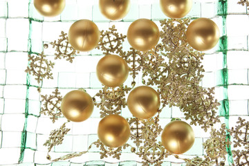 Christmas balls background on the green plate