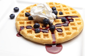 Waffle with Syrup and Blueberries