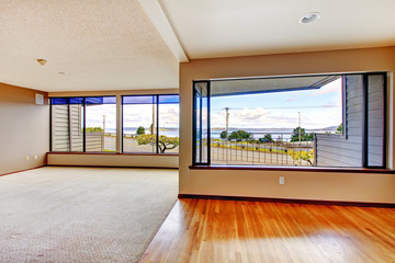 Apartment living room with large windows.