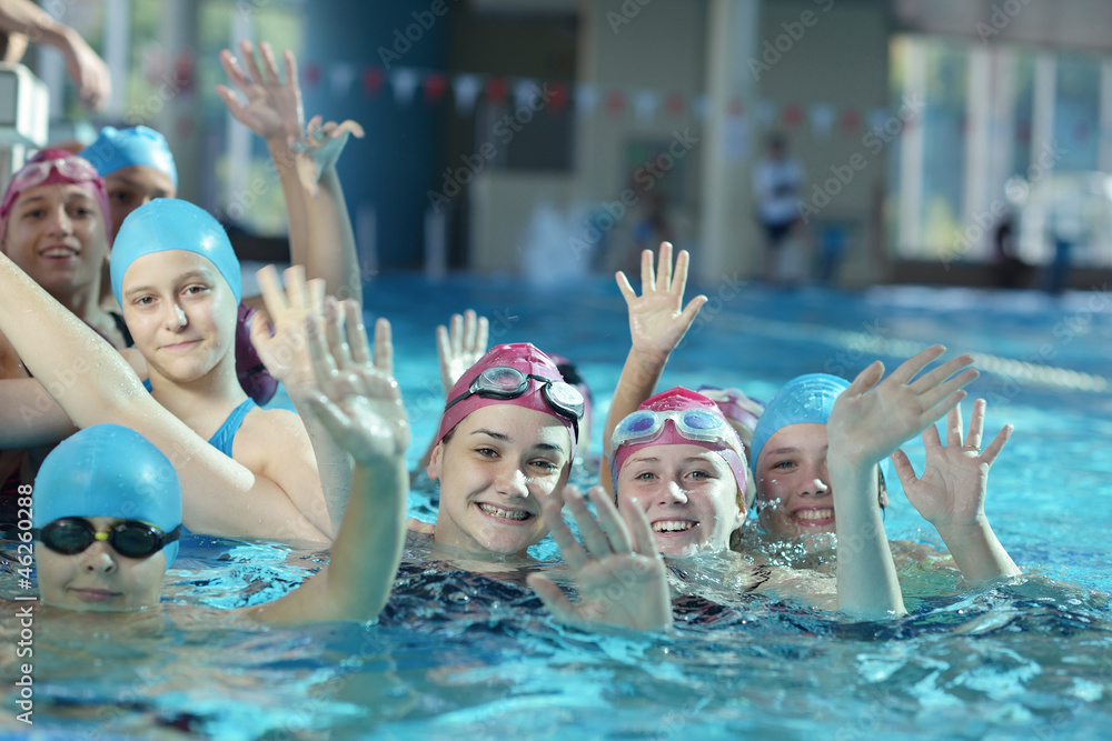 Wall mural happy childrens at swimming pool