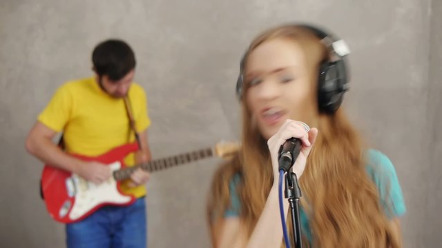 Musician rock band recording song in studio