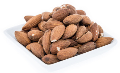 Heap of Almonds isolated on white