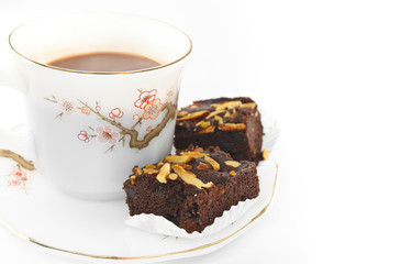 Almond brownies and  cup of coffee