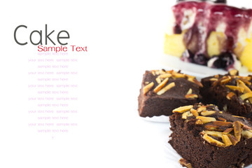 Piece of  almond brownies and blueberries cheese cake