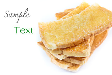Stack of  crunchy garlic bread on white background