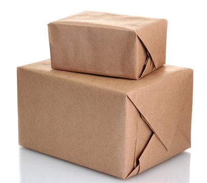 parcels boxes with kraft paper, isolated on white