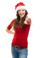 Woman in Santa hat gives thumbs up.