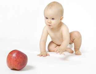 niemowle i jabłko - obrazy, fototapety, plakaty