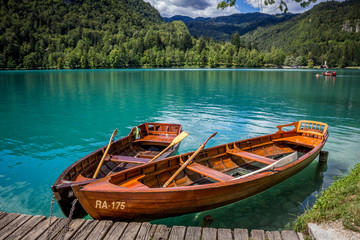 Boats at the pier of the Bled Island, Lake Bled, Slovenia.