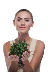 woman with a bundle of fresh mint. Concept vegetarian dieting