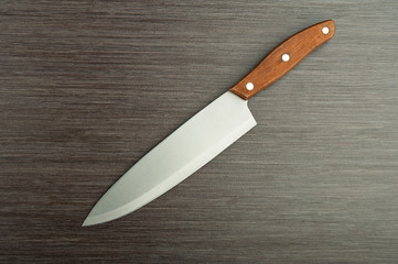 kitchen knife on  wooden background