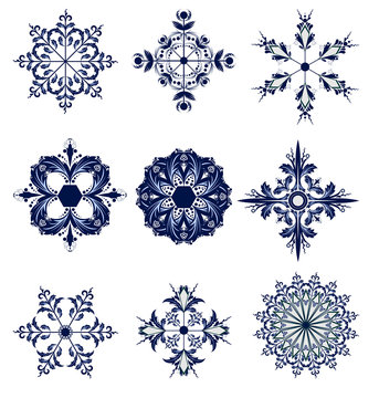 set of blue snowflakes icon collection