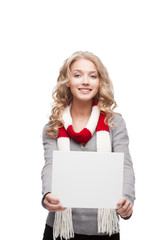 Naklejka premium young smiling woman holding sign