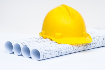 yellow hardhat and construction tools