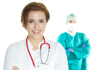 Female doctor in front of an operating surgeon