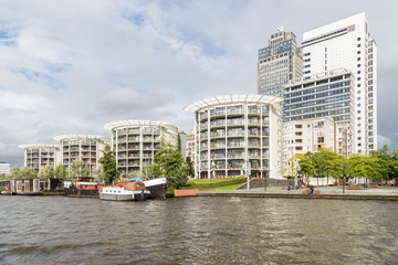 Amsterdam office buildings along the river Amstel in The Netherl