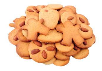 Pile of homemade almond biscuits isolated on white background