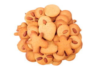 Pile of homemade almond biscuits isolated on white background