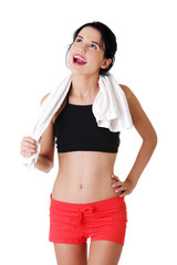 Happy active woman in sports clothes