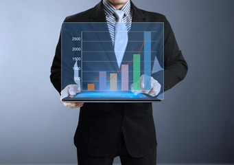 Businessmen graph on tablet