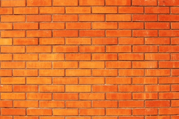Just a red brick wall, nothing else