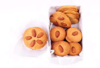 Almond cookies on isolated white background. Christmas baking.