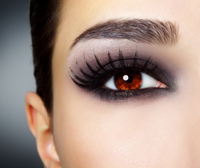 Naklejka premium Eye with black fashion make-up